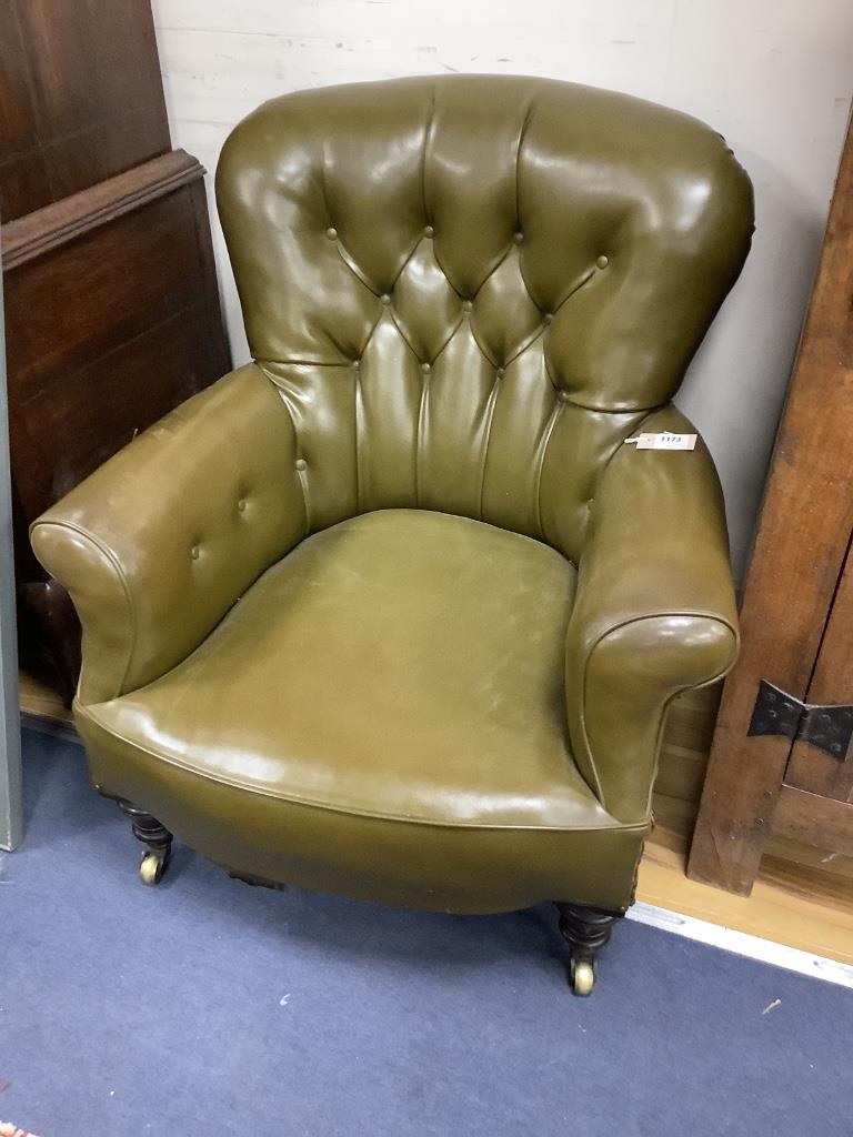A Victorian buttoned library chair upholstered in olive green leatherette, width 70cm, depth 70cm, height 86cm